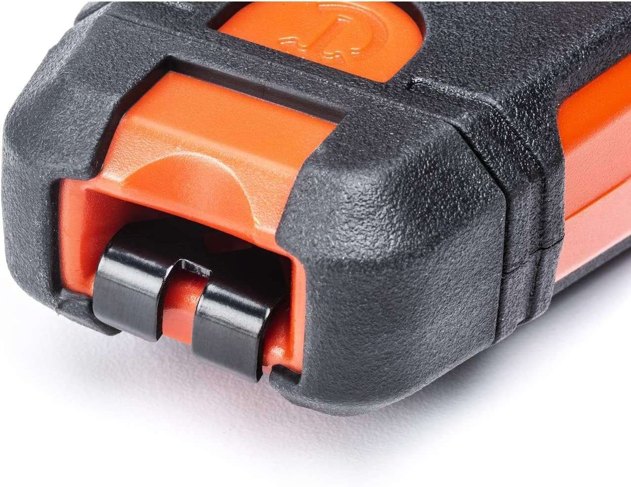 Extreme close-up of the nesting storage recess on the Crescent Lufkin chalk reel, showing how the end hook sits flush with the housing to prevent snags.