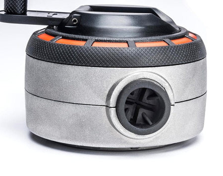 A close-up of the back of the Crescent Lufkin chalk reel, showing the one-way fill valve, which is designed for mess-free refills.