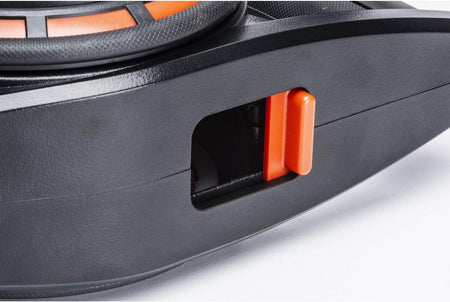 A detailed close-up of the orange slide-door opening on the side of the Crescent Lufkin chalk reel, used for refilling chalk.