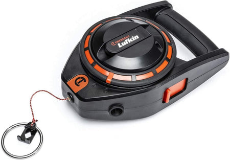 A three-quarter studio shot of the Crescent Lufkin 150-foot construction chalk reel, showing its black and orange body, D-handle, and the braided line with the combo hook/ring extended.