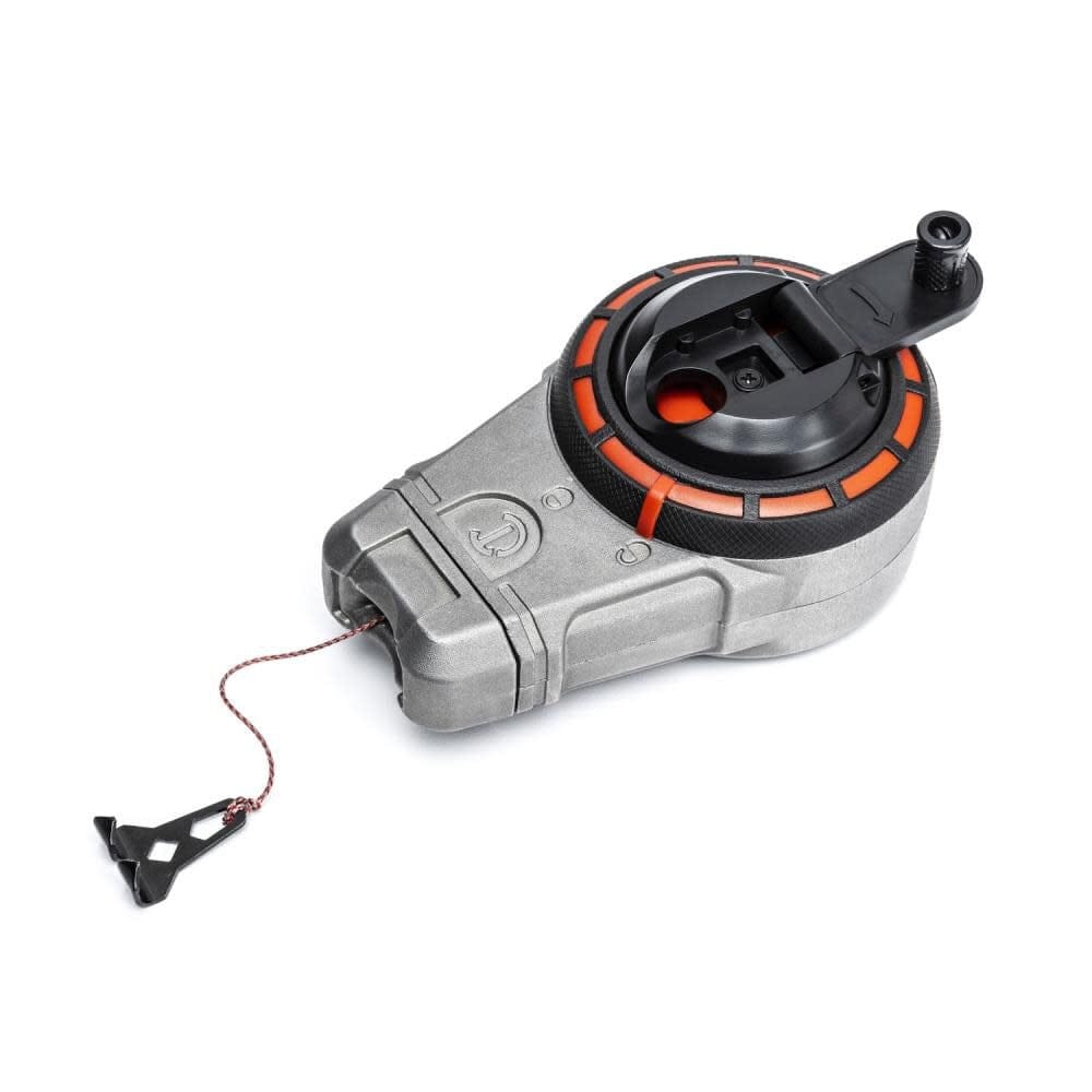 Angled view of the Crescent Lufkin aluminum chalk reel with the rapid-rewind 6 to 1 gear ratio crank handle deployed and the braided line partially extended.