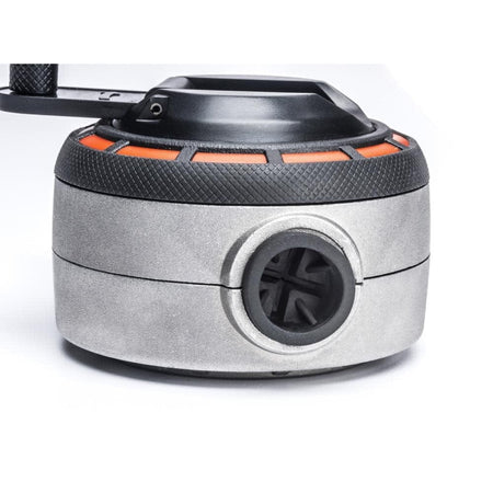 Macro side view of the Crescent Lufkin professional aluminum chalk reel focusing on the textured housing and the precision-engineered one-way fill valve.