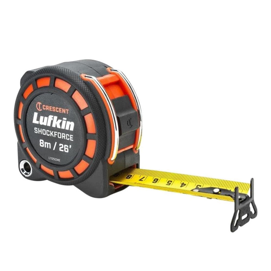 A Crescent Lufkin L1125CME Shockforce 8m/26-foot tape measure with a dual-sided yellow steel blade partially extended, featuring high-contrast markings, a matte nylon coating for glare reduction, and a 360-degree diamond-coated end hook.