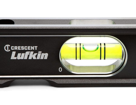 A high-resolution close-up of the horizontal vial on the Crescent Lufkin billet level showing the clear pitch lines and the 25% larger magnified bubble for enhanced reading accuracy in low-light environments.