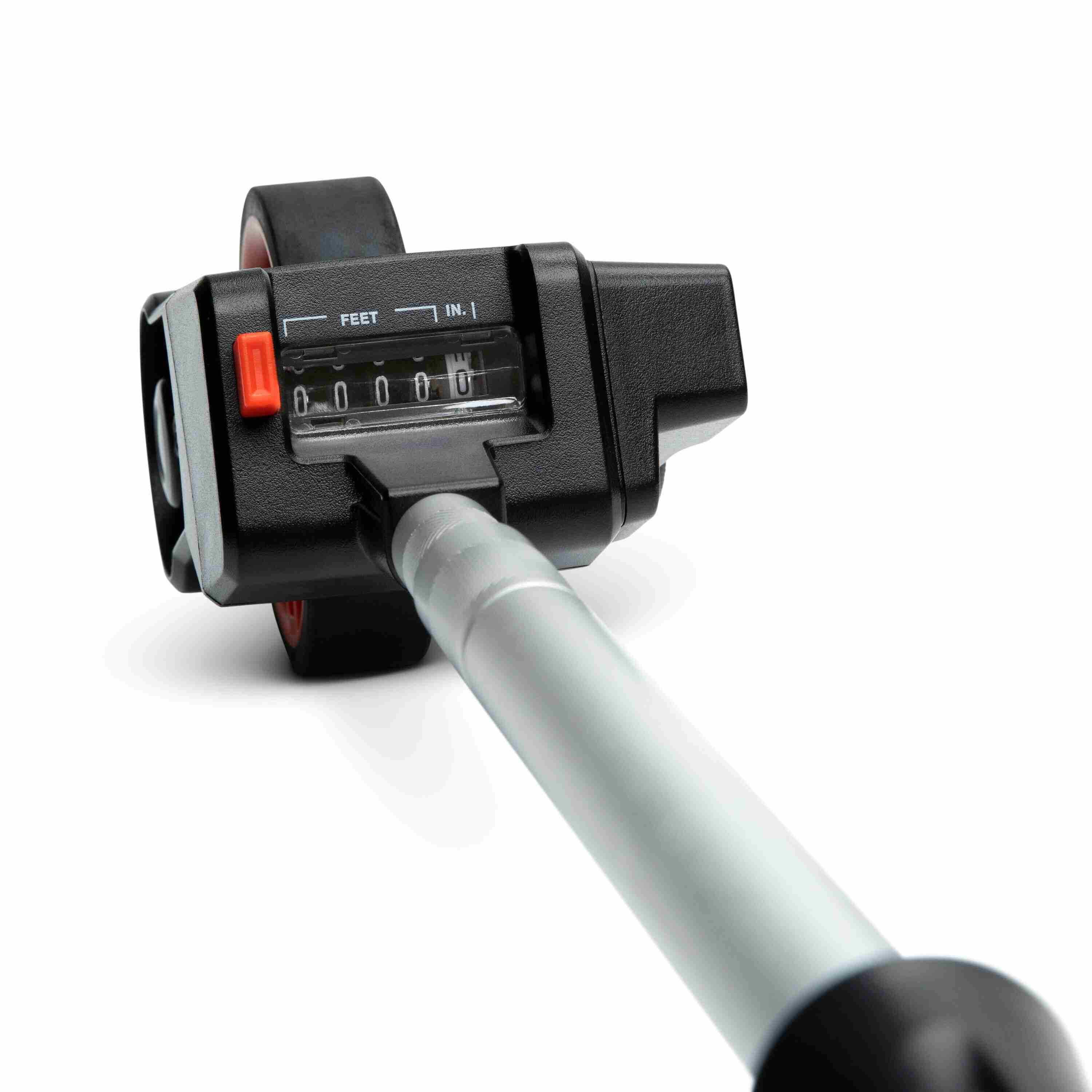 Top-down view of the Crescent Lufkin compact measuring wheel analog counter dial calibrated in feet and inches for accurate SAE distance calculations.