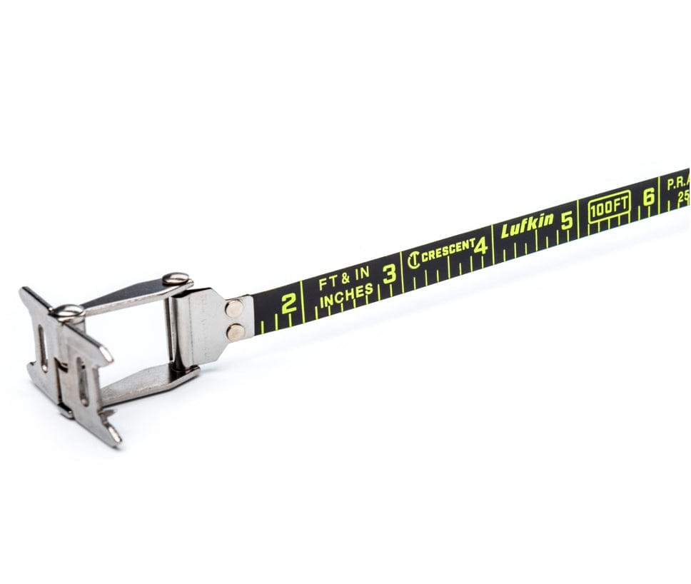 A high-resolution close-up of the Crescent Lufkin Nite Eye 100-foot tape blade, showcasing the high-visibility green markings on a matte black steel surface and the extra-wide dual-sided end hook for versatile measurements.