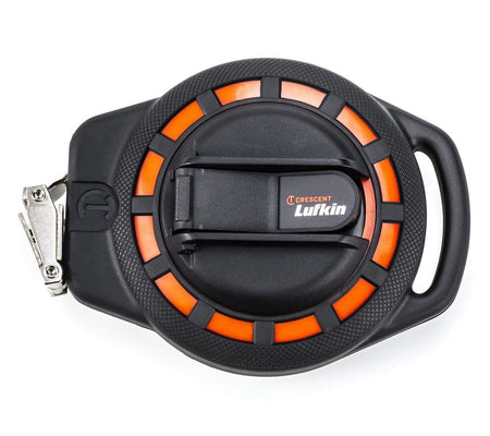 A professional product photograph of the Crescent Lufkin ST50-07 50-foot steel long tape measure featuring a rugged black and orange impact-resistant ABS case with a compact open-reel design.