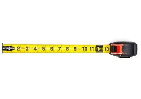 Top-down view of the tape measure showing the yellow blade extended with standard horizontal SAE measurements in black and red on the front side.
