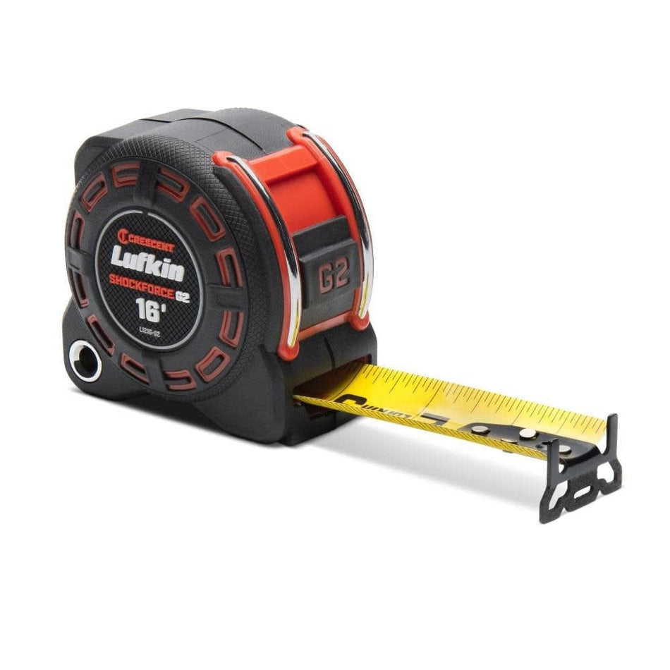 Angled product view of the Crescent Lufkin L1216CME-02 Shockforce G2 5m/16-foot tape measure featuring an extra-wide 1-1/4 inch high-visibility yellow steel blade with metric and imperial markings, a rugged black and orange impact-resistant case, and an advanced 360-degree end hook.