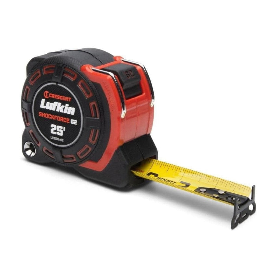 Angled product view of the Crescent Lufkin L1225ALCME-02 Shockforce G2 26-foot (8m) auto-lock tape measure featuring an extra-wide 1-1/4 inch high-visibility yellow steel blade with metric and imperial markings, a rugged black and orange impact-resistant case, and an advanced 360-degree end hook.