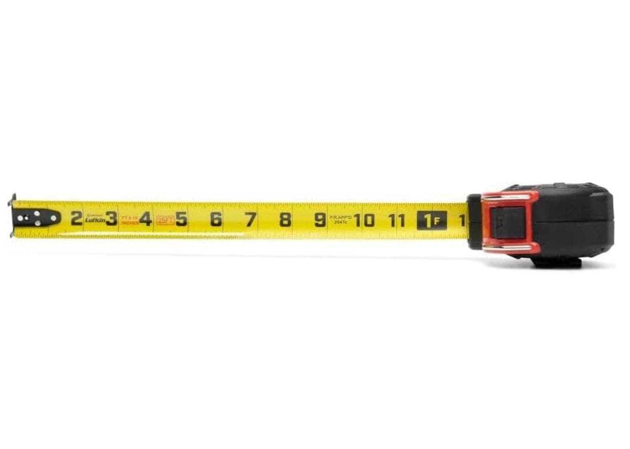 Top-down view of the 26-foot Shockforce G2 blade fully extended from the case, illustrating the large-print SAE imperial measurements and 360-degree diamond-coated end hook designed for professional layout work.