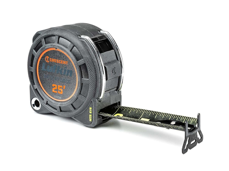 Angled product shot of the Crescent Lufkin L1125B-02 Shockforce Nite Eye tape measure with the matte black blade partially extended, showing the high-visibility green markings and the heavy-duty 360-degree endhook.