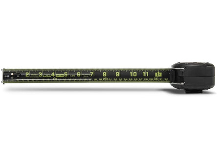 A top-down view of the extended dual-sided blade of the Crescent Lufkin Shockforce G2, displaying a metric centimeter scale and a standard SAE inch scale with enlarged numbers.