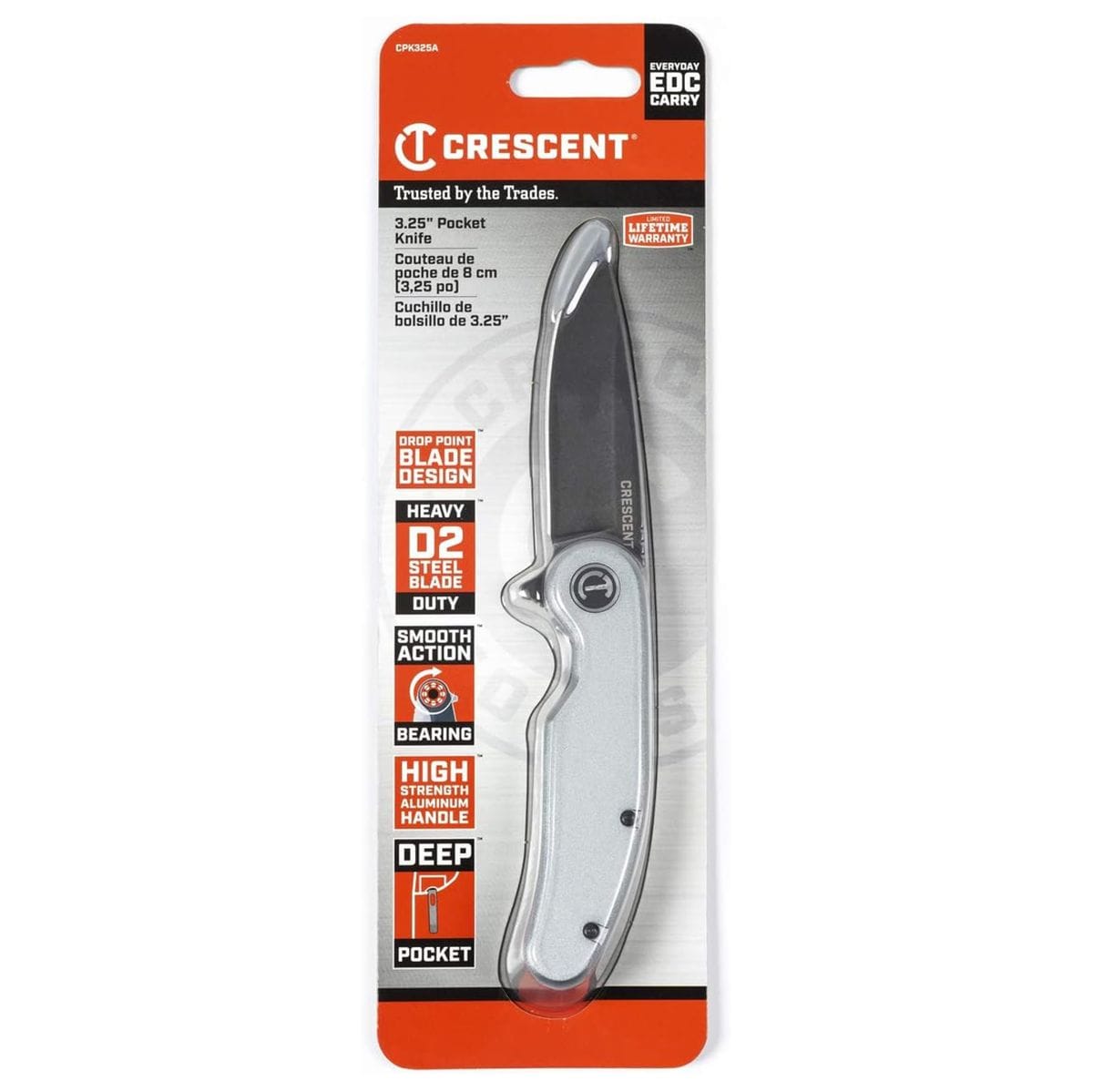 Full view of the Crescent CPK325A folding utility knife housed in its retail blister card pack packaging, showing prominent front labels highlighting a 3.25-inch pocket knife, drop point blade design, heavy-duty D2 steel, smooth bearing action, high-strength aluminum handle, and a deep pocket clip.