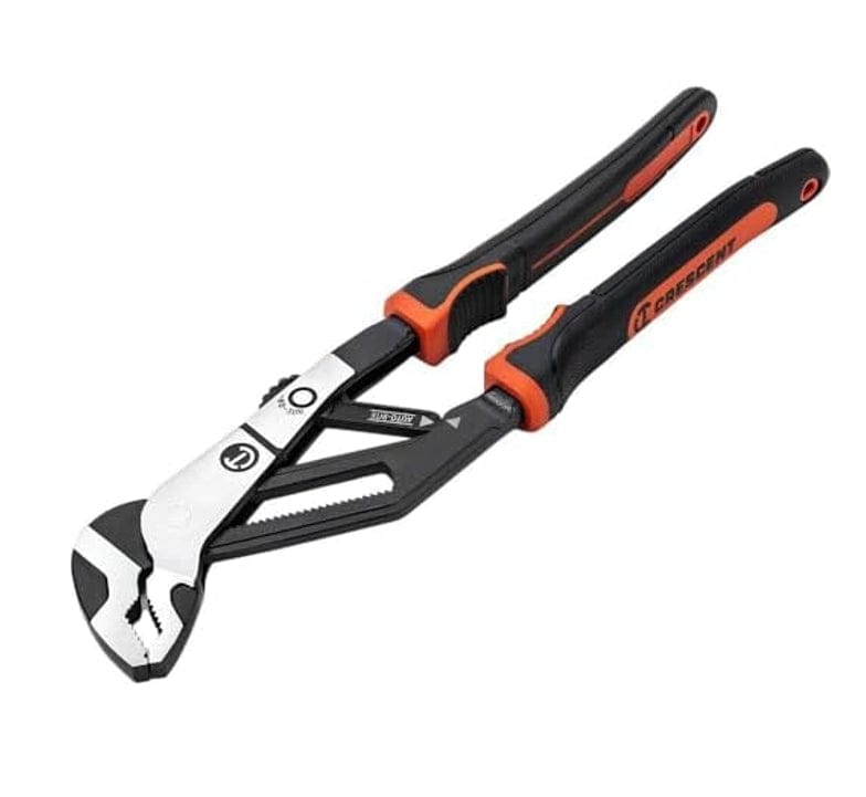 An isometric view of the Crescent 10-inch tongue and groove pliers emphasizing the professional ergonomic dual-material grips with integrated tether points for safety when working at heights.