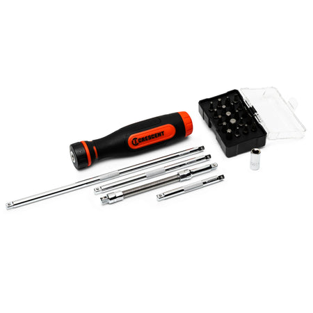Crescent CRBSDS26PC 26-piece ratcheting bit driver set components laid out on a white background, including the dual-material rawhide and black orange-accented handle, four chrome-plated extensions, a hex bit adapter, and a separate plastic case containing twenty Phillips, slotted, hex, and Torx bits.