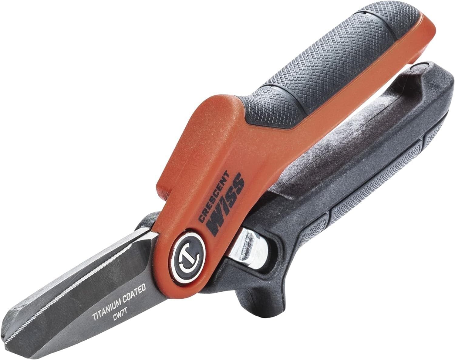 A studio shot of the Crescent Wiss 7.5-inch titanium coated tradesman utility shears in a closed position, showcasing the durable rawhide and black ergonomic soft-grip handles and the corrosion-resistant titanium blade finish.
