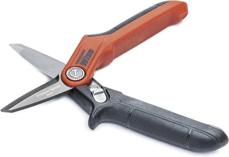 An angled view of the Crescent Wiss tradesman shears in an open position, highlighting the sharp titanium-coated stainless steel blades and the heavy-duty spring-loaded handle design for industrial cutting applications.