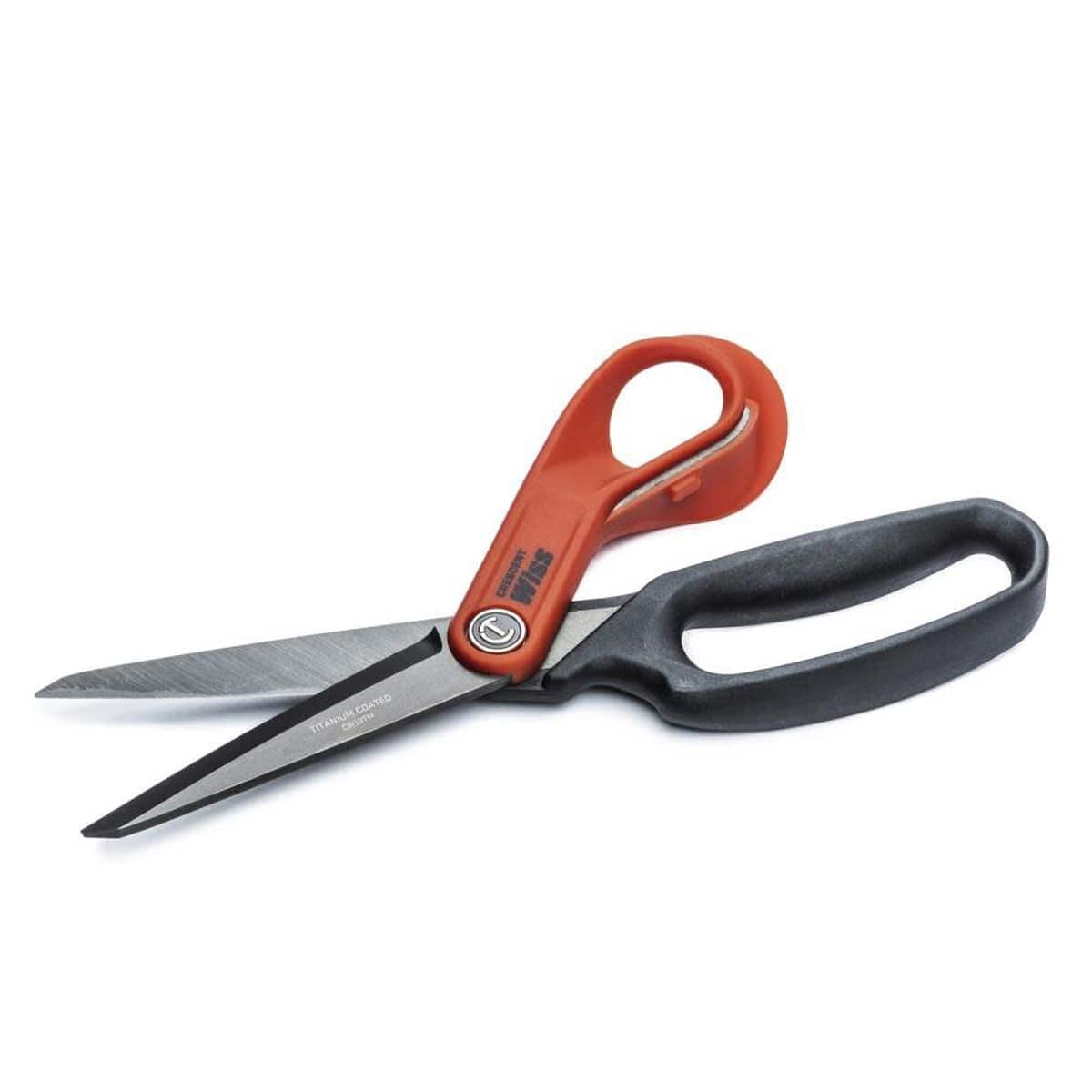 Detailed view of the open Crescent Wiss shears illustrating the sharp titanium-finished cutting edges and the high-strength pivot point designed for demanding jobsite use.
