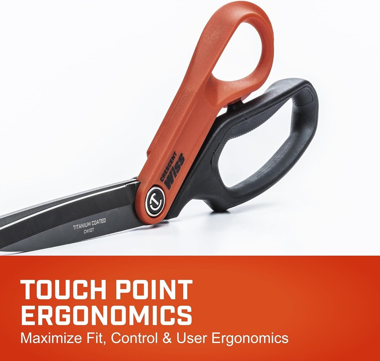Detail of the touch-point ergonomics on the Crescent Wiss shears, highlighting the specialized control channel and textured TPR grips that maximize user fit and stability.