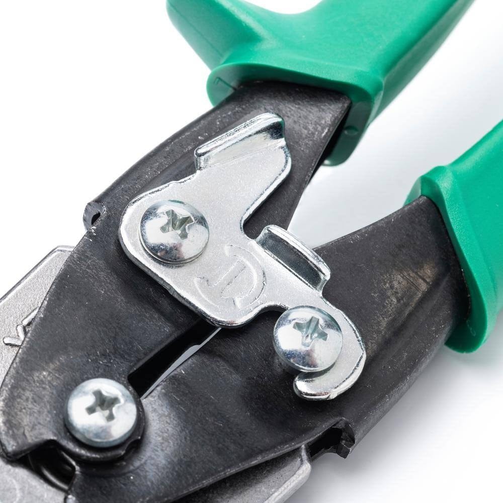 Detailed close-up of the central compound action pivot mechanism and the metal locking latch located between the green handles of the snips.