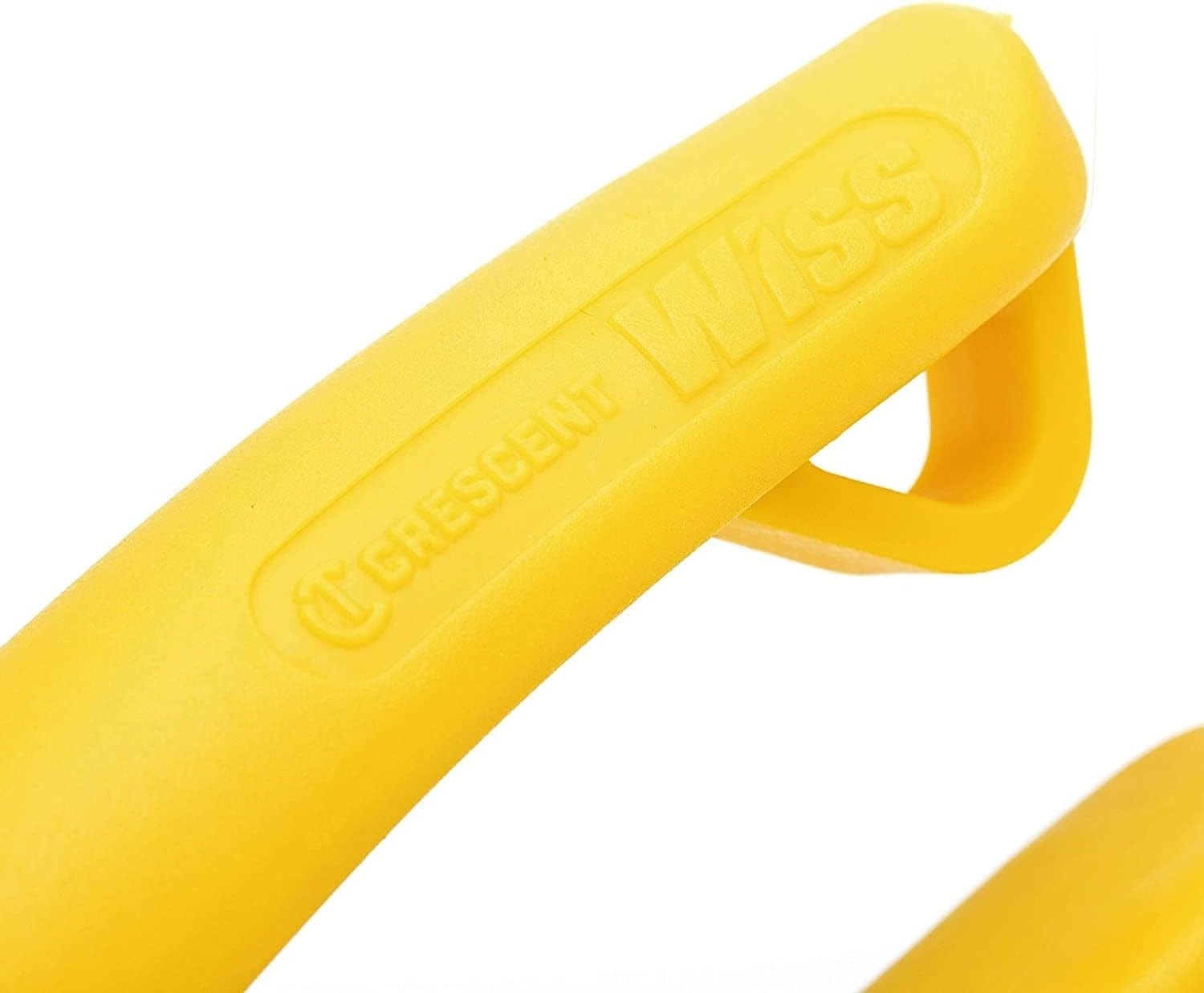A close-up view of the yellow handle on the Crescent Wiss M3R snips, showcasing the embossed brand logos and the durable, single-material non-slip texture designed for industrial use.