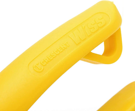 A close-up view of the yellow handle on the Crescent Wiss M3R snips, showcasing the embossed brand logos and the durable, single-material non-slip texture designed for industrial use.