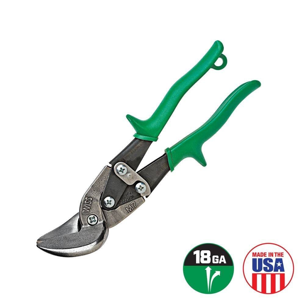 A high-angle studio shot of the Crescent Wiss M7R MetalMaster aviation snips featuring green non-slip ergonomic grips and precision-ground molybdenum steel blades designed for right and straight metal cutting.