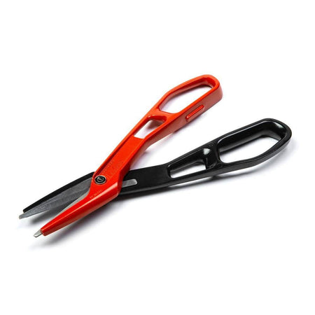 Angled perspective of the red and black aluminum tinner snips against a white background, emphasizing the lightweight design built to reduce user fatigue during repetitive metal cutting.