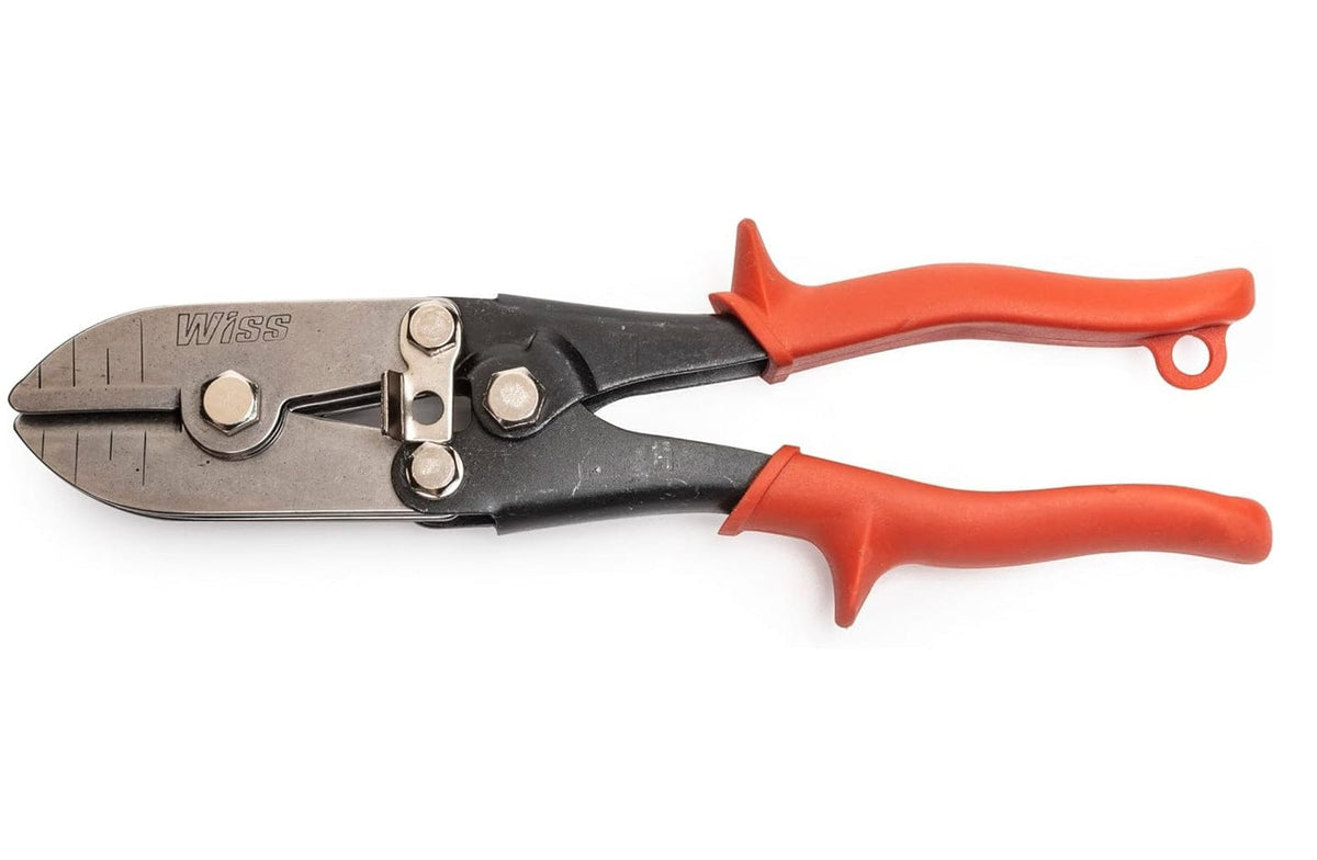 A professional studio photograph of the Crescent Wiss WC5SN 5-blade HVAC pipe crimper showing the high carbon steel compound action jaw and ergonomic rawhide orange non-slip cushion grips.