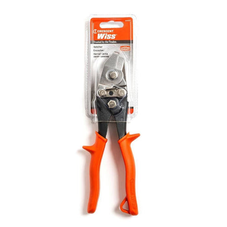 A professional retail packaging shot of the Crescent Wiss WHN1N hand notcher showing the tool secured in its clear clamshell card, detailing its use as a precision HVAC notching tool with a limited lifetime warranty.