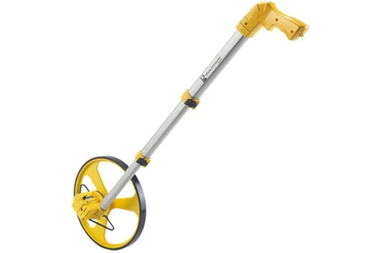 A side profile of the Cst/Berger RT312 measuring wheel, showing its large yellow spoked wheel, aluminum telescopic handle, and yellow ergonomic pistol grip.