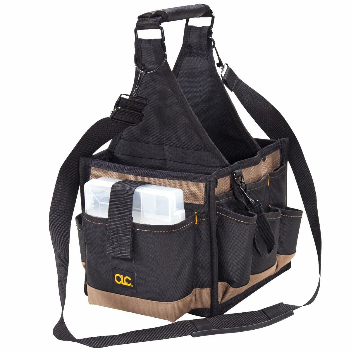 The Custom Leathercraft 25-pocket tool carrier bag viewed from an angle, empty but showing the black and tan fabric, the padded shoulder strap, and the included clear plastic multi-compartment parts tray secured in an exterior pocket.