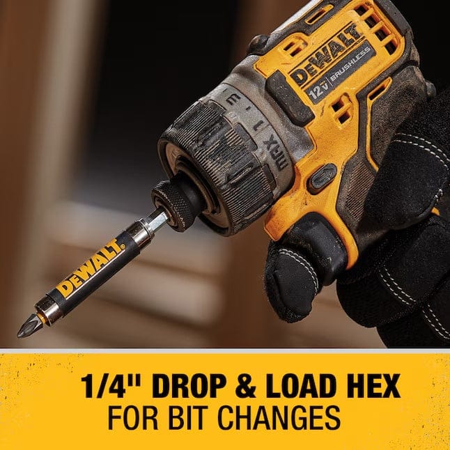 Close-up of DeWALT 12V brushless screwdriver held by gloved hand, showing drop-and-load hex chuck and torque settings.