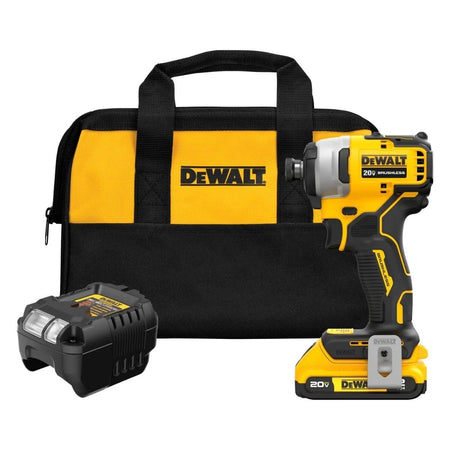 A product group shot featuring the Dewalt Atomic 20V MAX impact driver, a compact battery, a charger, and a black and yellow Dewalt contractor bag.