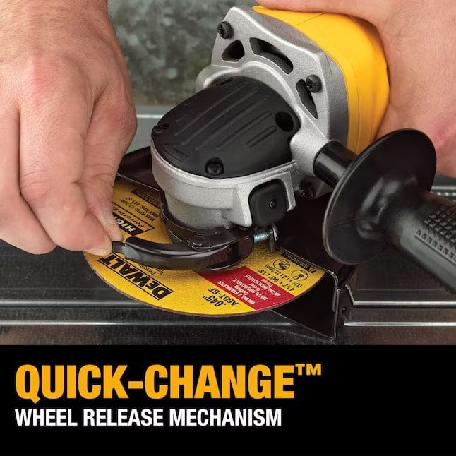 Hands operating DEWALT DCG412B angle grinder with Quick-Change™ wheel release mechanism; grinding wheel and tool branding clearly visible.