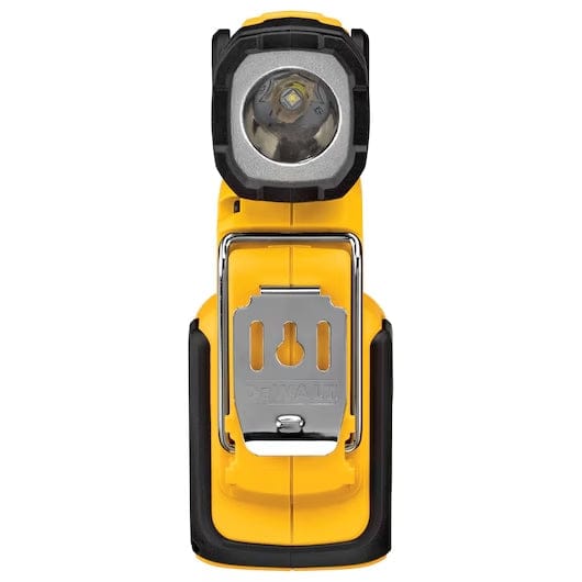 Front view of DEWALT LED work light with cylindrical bulb and metal clip engraved with logo, designed for mounting or carrying in workshop settings.
