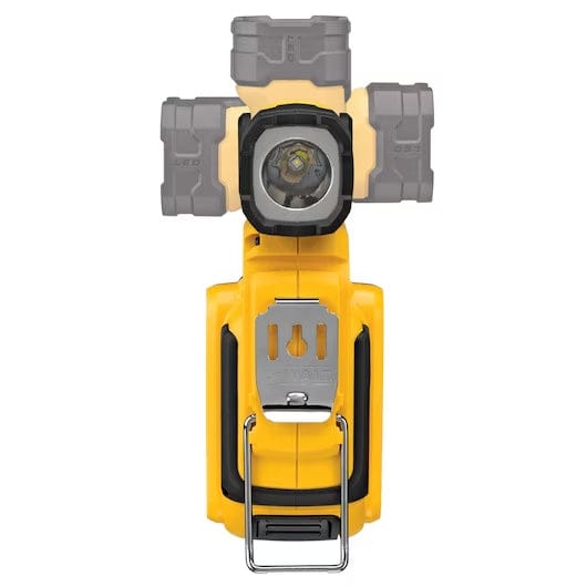 Rugged DEWALT LED work light with central lens, rubber bumpers, metal clip, and foldable stand, designed for hands-free use in jobsite environments.