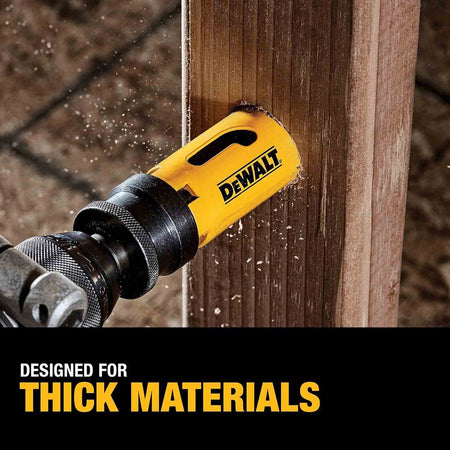 DEWALT hole saw cutting through thick wood beam with visible sawdust, labeled “Designed for Thick Materials,” demonstrating heavy-duty performance.