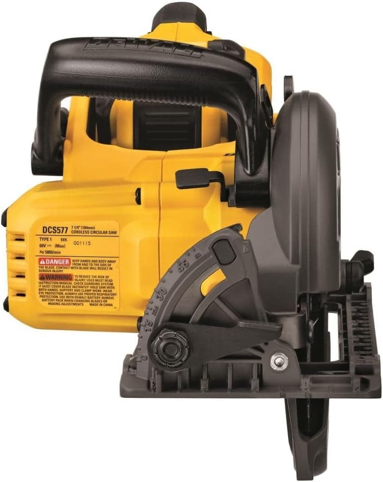 Side view of DEWALT DCS577 60V MAX cordless circular saw showing bevel gauge, blade guard, and safety label on tool housing.
