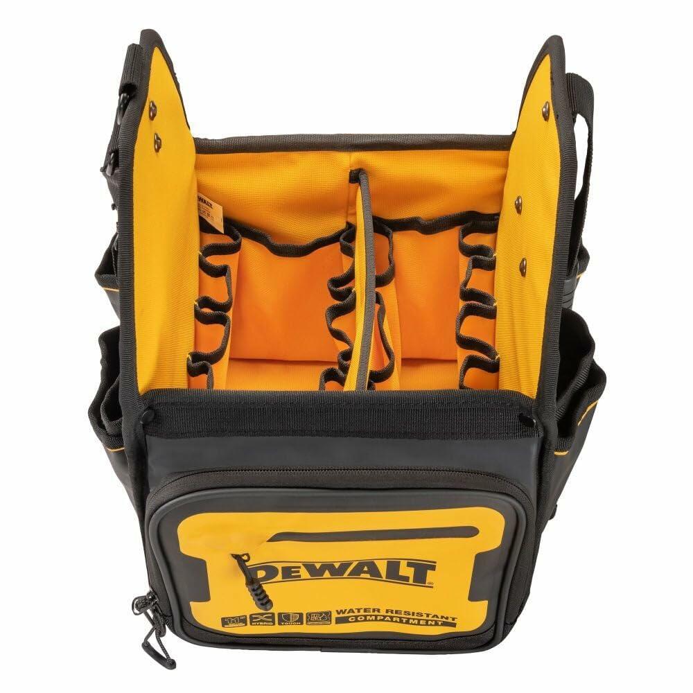 Top-down view of an empty DEWALT tool tote bag showing a bright yellow interior with multiple side pockets. The base is made of hard black plastic for durability, and the padded handle is visible at the top, designed for comfortable carrying.