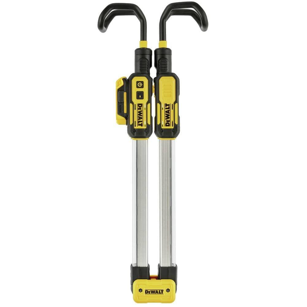 Pair of DEWALT LED work lights mounted on extendable poles with top hooks. Lights feature rugged casing, control buttons, and battery compartments, suitable for overhead jobsite or garage lighting.
