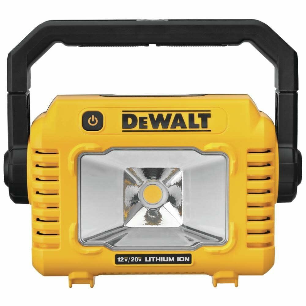 A direct front view of the yellow and black DEWALT compact LED work light, showing the main light panel and the 360-degree rotating handle in the upright position.