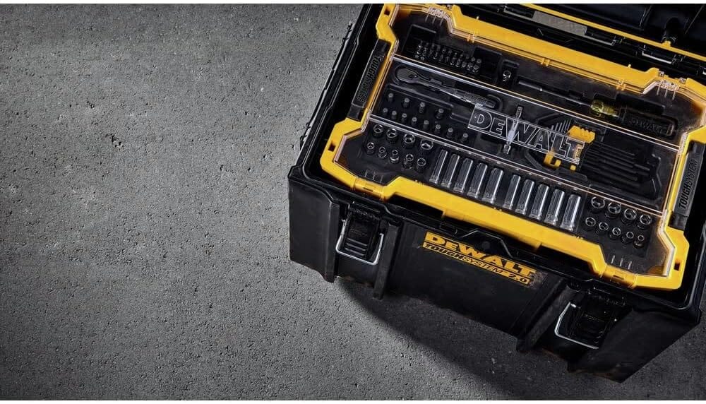 A DEWALT mechanics tool tray nested inside a larger ToughSystem 2.0 rolling toolbox, demonstrating how this set integrates perfectly into the larger DEWALT mobile storage ecosystem.