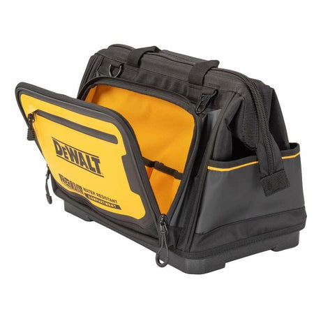 The DEWALT Pro Tool Bag with its front water-resistant compartment unzipped and open, revealing the yellow interior.