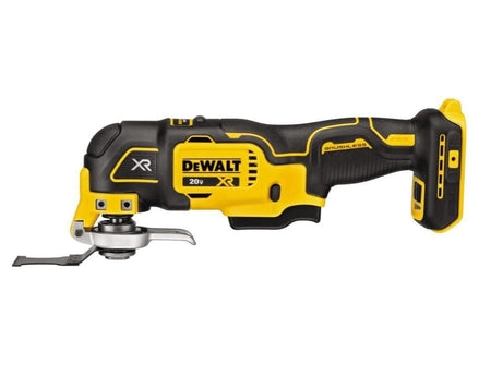 A profile view of a Dewalt 20V MAX XR brushless cordless oscillating multi-tool with a blade attached.