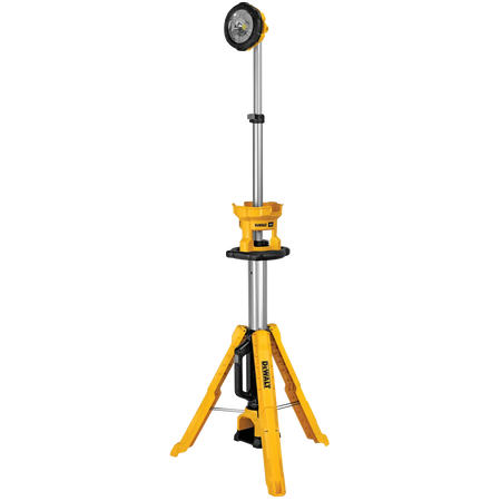 A front view of the DEWALT telescoping LED tripod light fully extended. The light features a height-adjustable silver pole that reaches up to 7 feet, providing overhead illumination to eliminate shadows on the jobsite while remaining stable on three yellow reinforced legs.