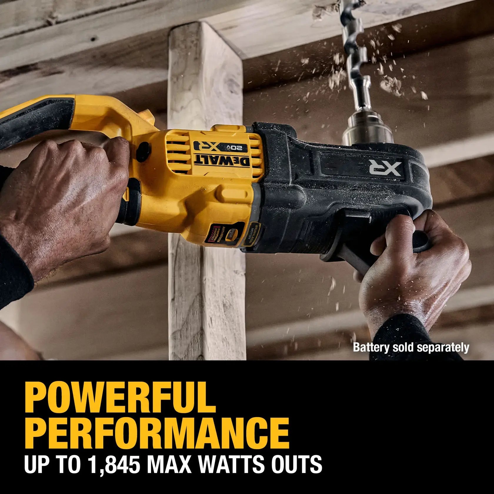 Professional application of the DEWALT DCD446B brushless drill providing 1,845 Max Watts Out to aggressively bore through overhead joists for utility rough-ins.