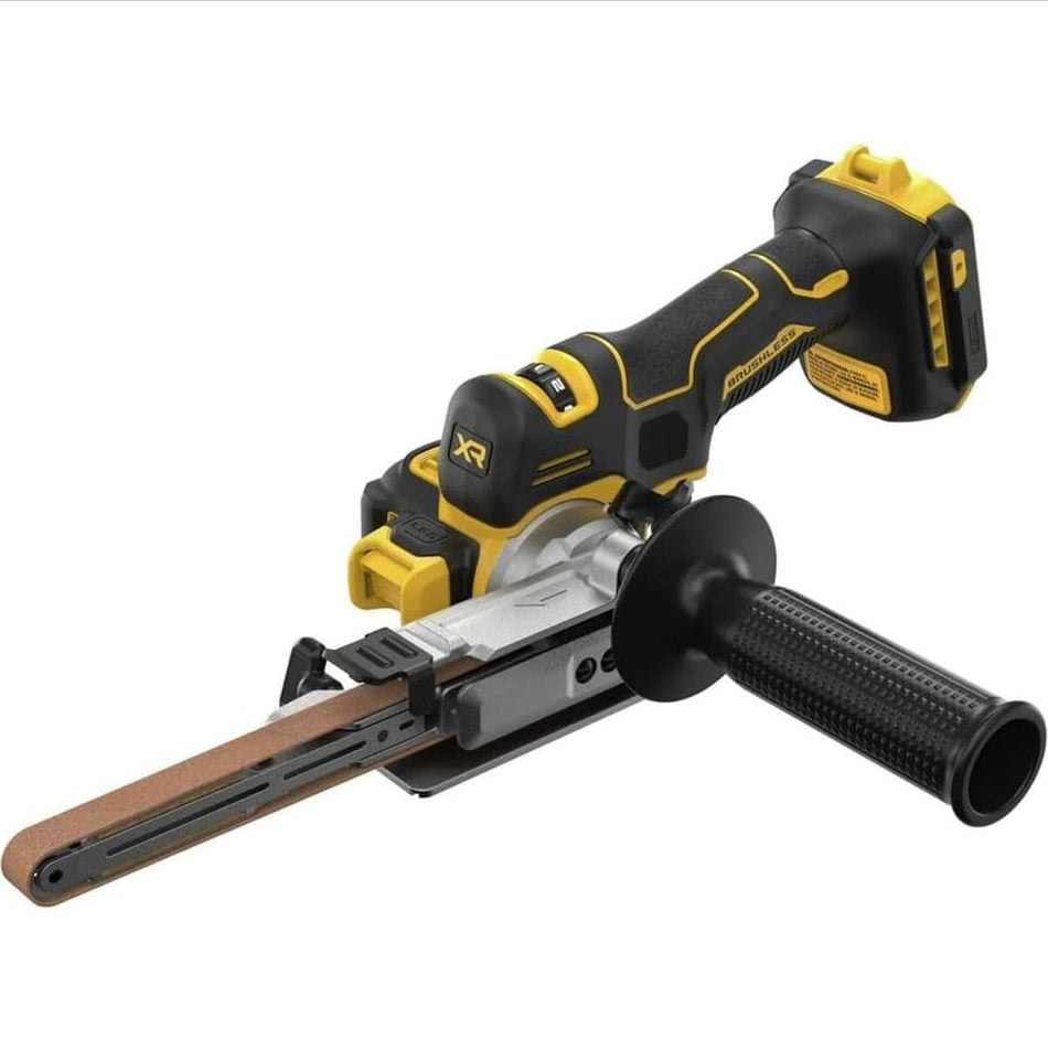 DEWALT 20V MAX XR brushless cordless 18-inch bandfile belt sander DCM200B shown from a high-angle perspective. The bare tool features a slim ergonomic handle, a rotating contact arm with a sanding belt, and a detachable side handle for stable control during metalworking.