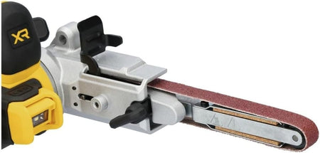 Close-up view of the DEWALT bandfile contact arm and sanding belt. The image showcases the high-quality narrow sanding belt, the integrated LED work light, and the quick-release lever for fast, tool-free belt adjustments and changes.